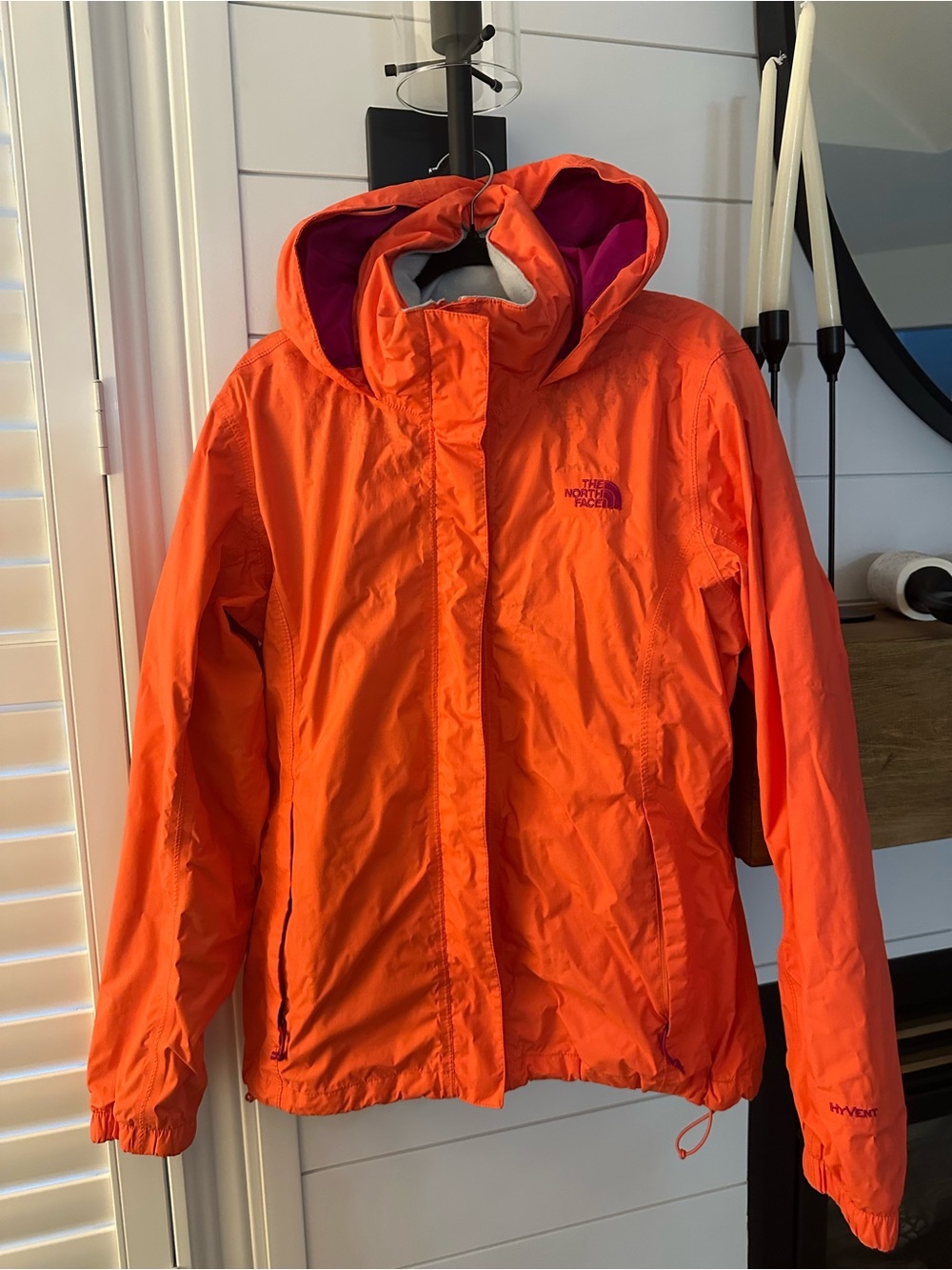 The North Face Orange Hooded Rain Jacket with Pink Lining